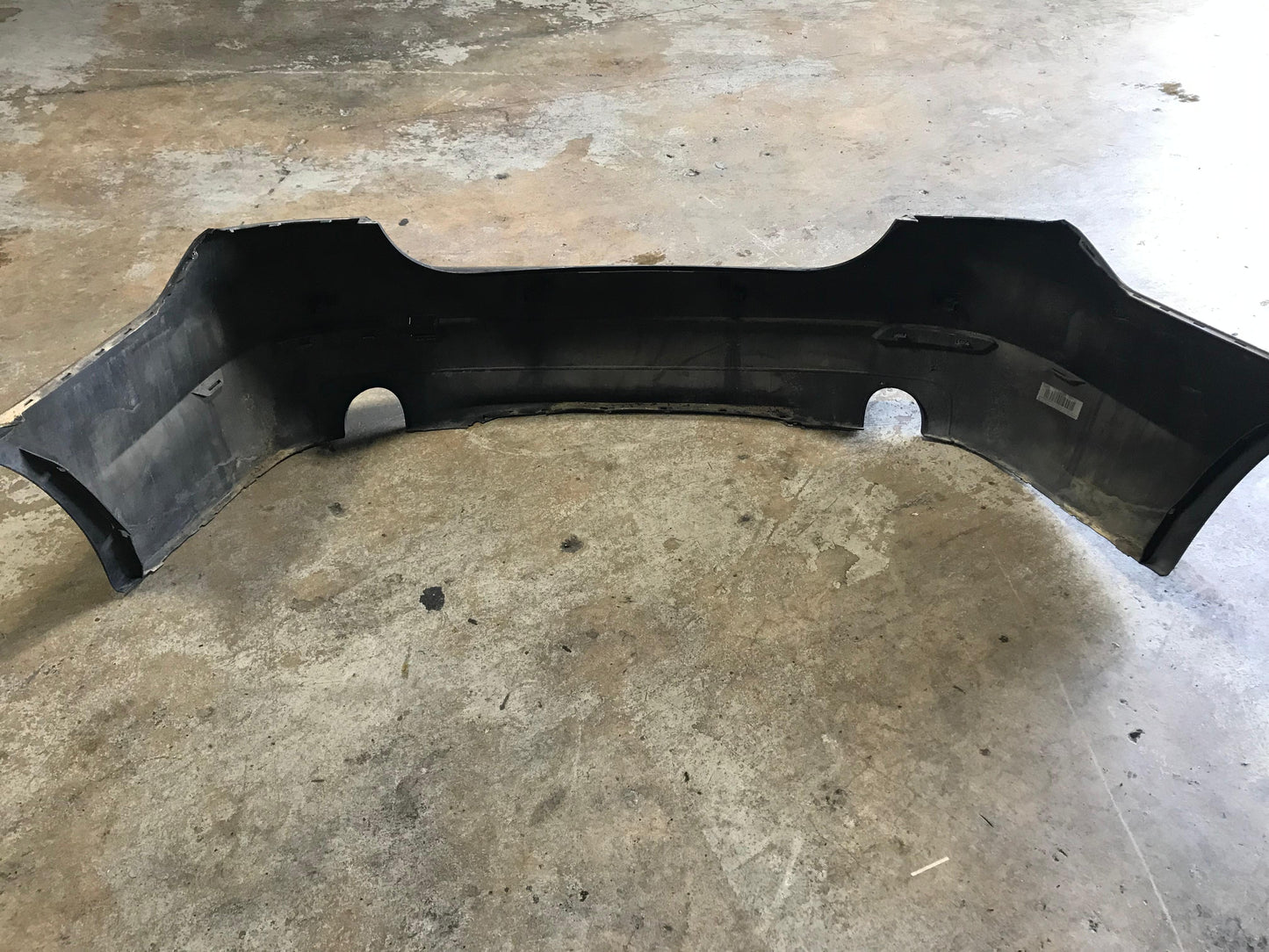 REAR BUMPER BLACK F10 535XI OEM SKU 731