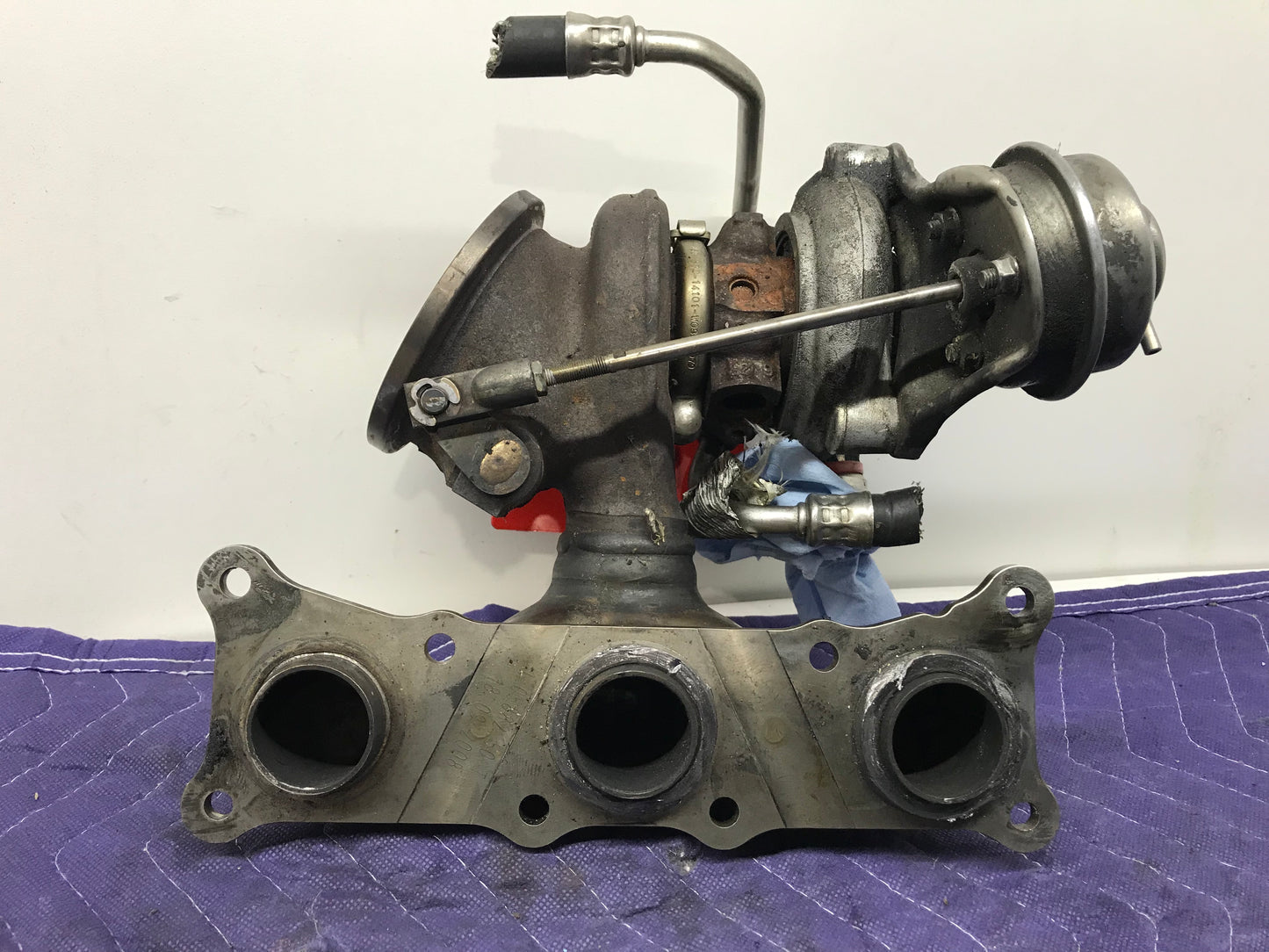 N54 ENGINE BANK 1 TURBOCHARGER W/EXHAUST MANIFOLD  SKU 166